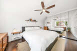 This stunning bedroom boasts a modern design with a touch of elegance.