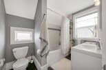 This charming bathroom features a modern design with a clean and inviting atmosphere.