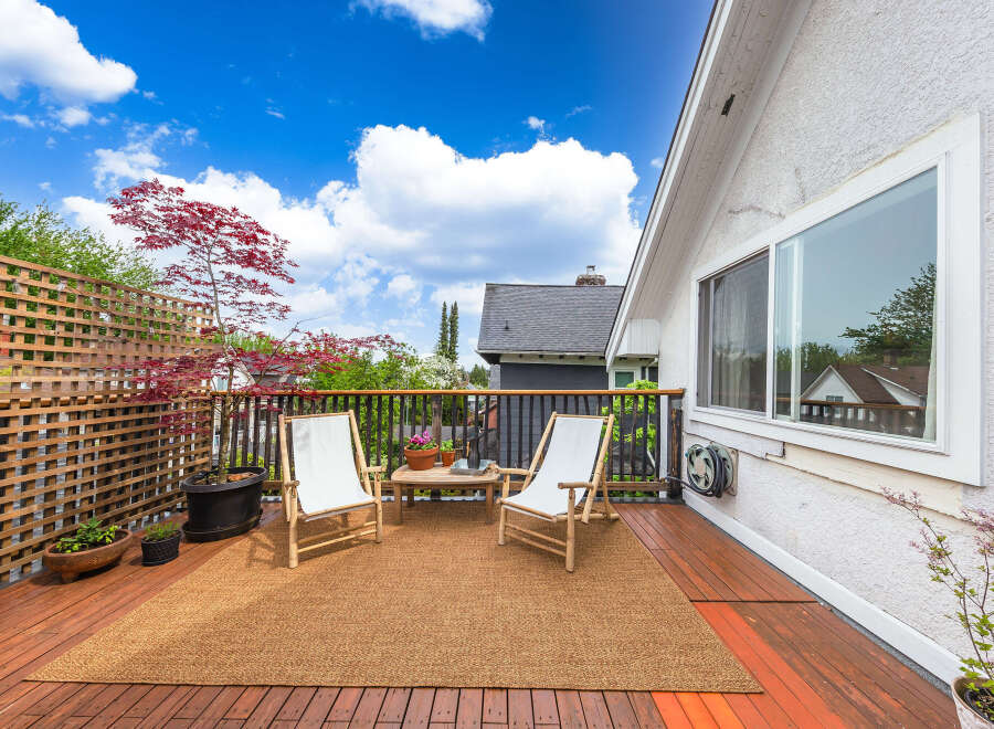Enjoy the tranquility of this beautiful outdoor deck, perfect for relaxation and entertaining.