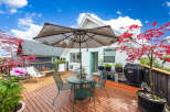 Enjoy outdoor living at its finest on this stunning deck! This property features a beautiful outdoor space, perfect for entertaining or relaxing.