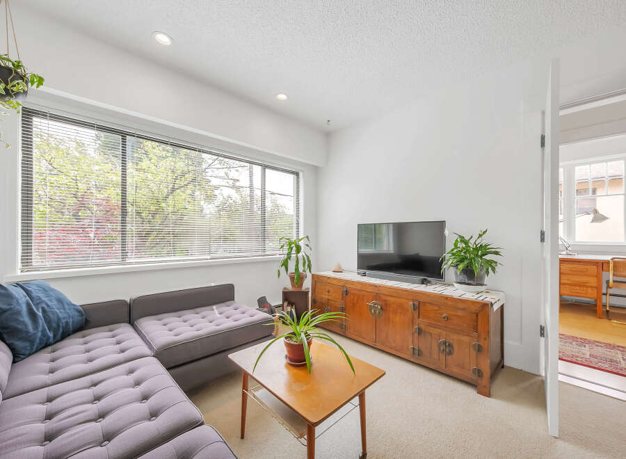 This stunning property boasts a bright and airy living room, perfect for relaxation and entertaining.