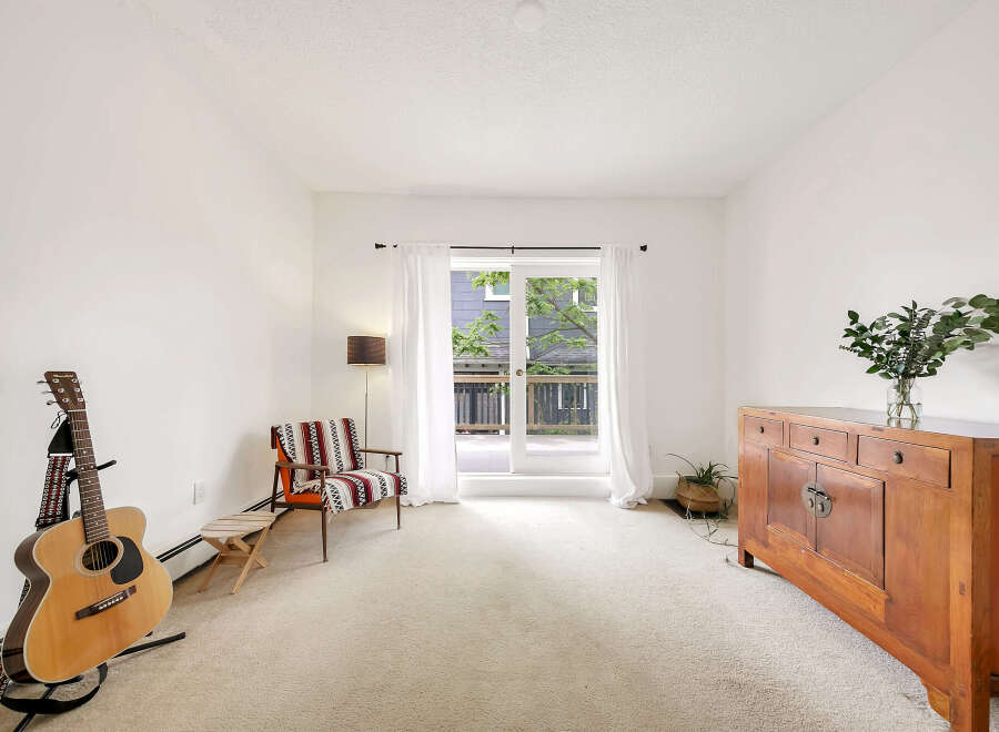 Step into this bright and airy living space, perfect for relaxation and entertaining.