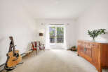 Step into this bright and airy living space, perfect for relaxation and entertaining.