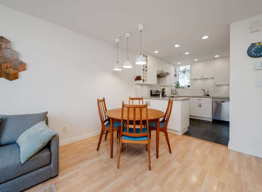 This charming property features a bright and airy dining area, perfect for entertaining or enjoying everyday meals.