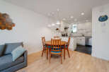This charming property features a bright and airy dining area, perfect for entertaining or enjoying everyday meals.