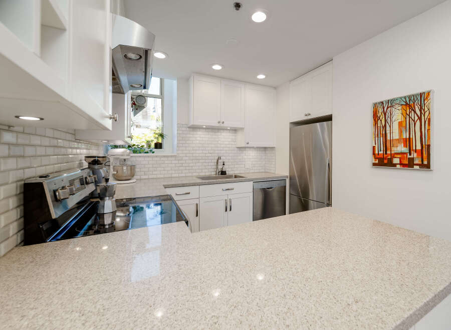 This stunning kitchen boasts modern design and functionality.
