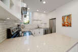 This stunning kitchen boasts modern design and functionality.