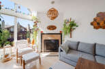 This stunning living room boasts a bright and airy atmosphere, perfect for relaxation and entertaining.
