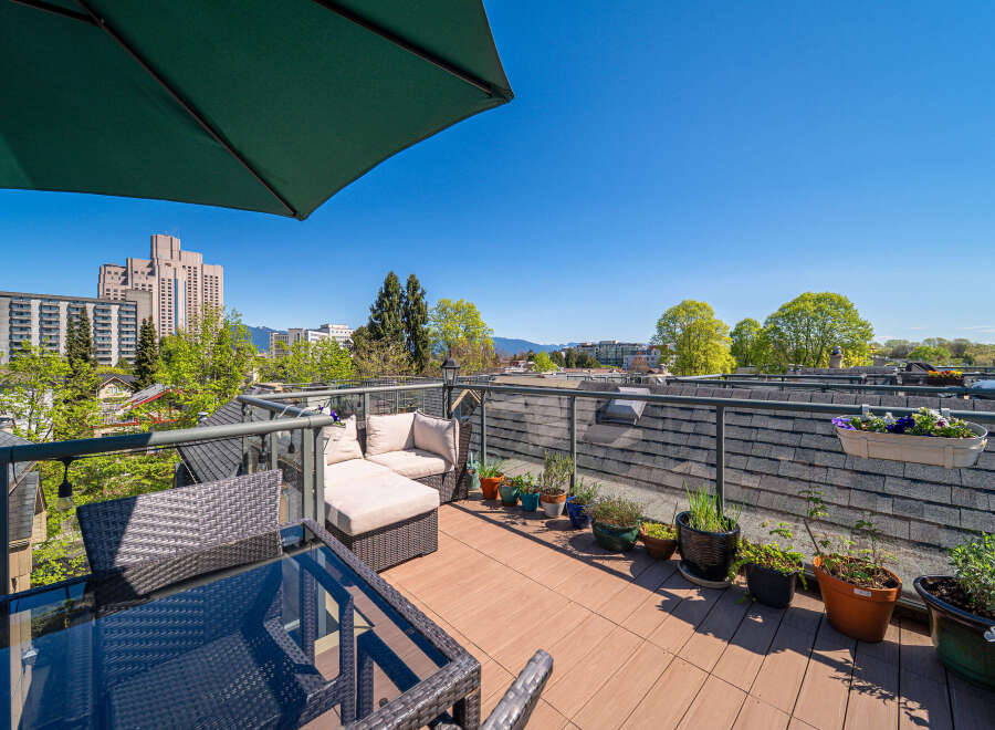 Enjoy breathtaking city views from this stunning rooftop terrace.