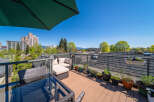 Enjoy breathtaking city views from this stunning rooftop terrace.