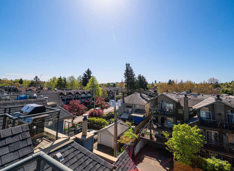 Enjoy stunning city views from this beautiful property! This home features a modern design with a rooftop deck, perfect for entertaining or relaxing.