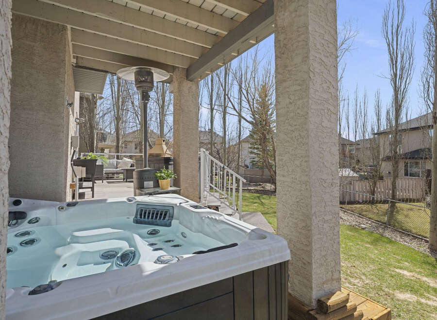 Enjoy the ultimate relaxation in this stunning outdoor oasis! This property features a luxurious hot tub, perfect for unwinding after a long day.