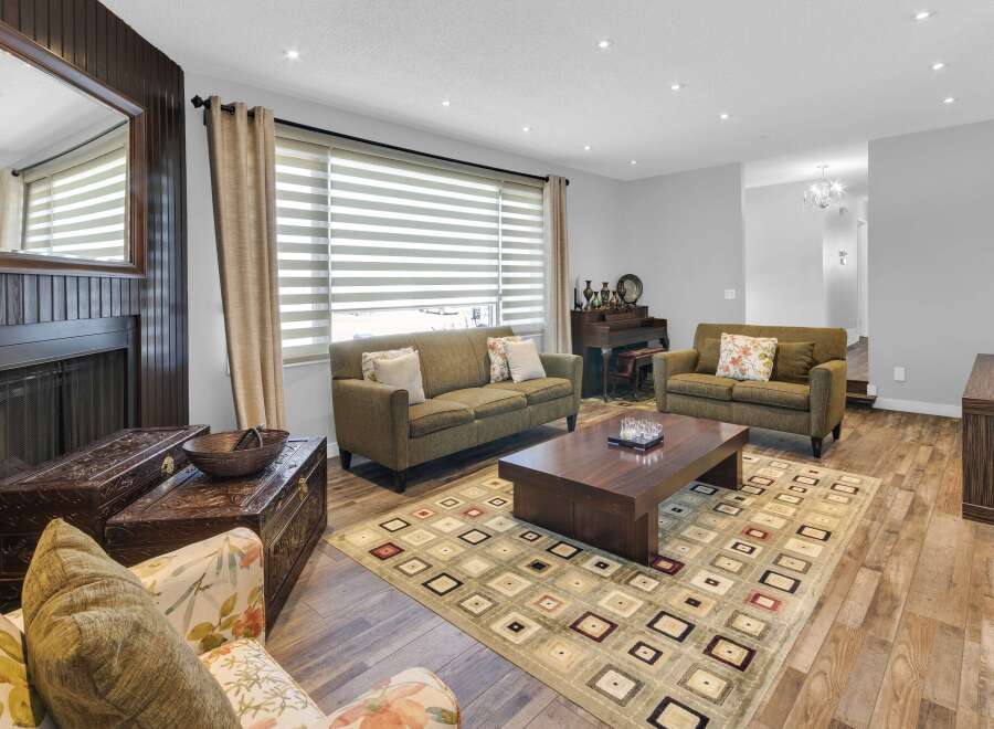 Step into this inviting living space, perfect for relaxation and entertaining.