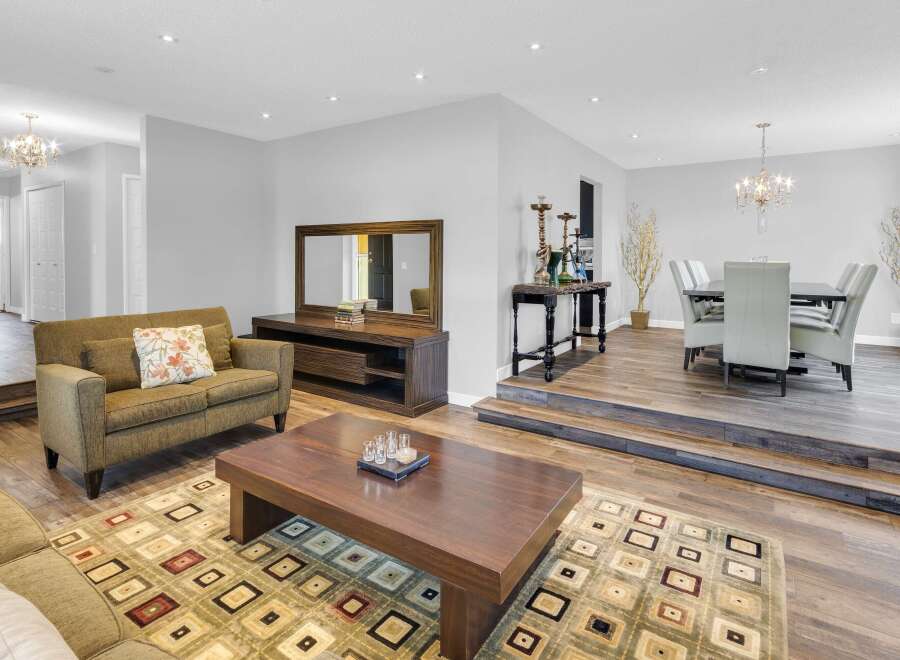 Step into luxury with this stunning living space, featuring a seamless blend of modern design and inviting comfort.