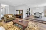 Step into luxury with this stunning living space, featuring a seamless blend of modern design and inviting comfort.