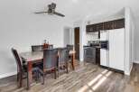 Step into this inviting kitchen and dining area, perfect for both everyday living and entertaining.