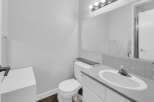 This modern bathroom features a sleek design with a clean aesthetic.