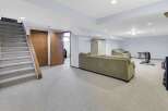 Discover the potential of this spacious basement, perfect for creating a cozy living area or a functional home gym.