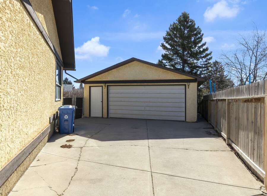 Discover the charm of this property, featuring a detached garage and a well-maintained exterior.
