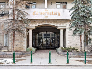 Discover luxury living at The Conservatory, a stunning property showcasing elegant architecture and a prime location.