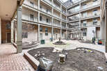 Discover a serene courtyard oasis, perfect for relaxation and community gatherings.