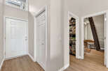 Step into this inviting entryway, showcasing a bright and airy atmosphere.