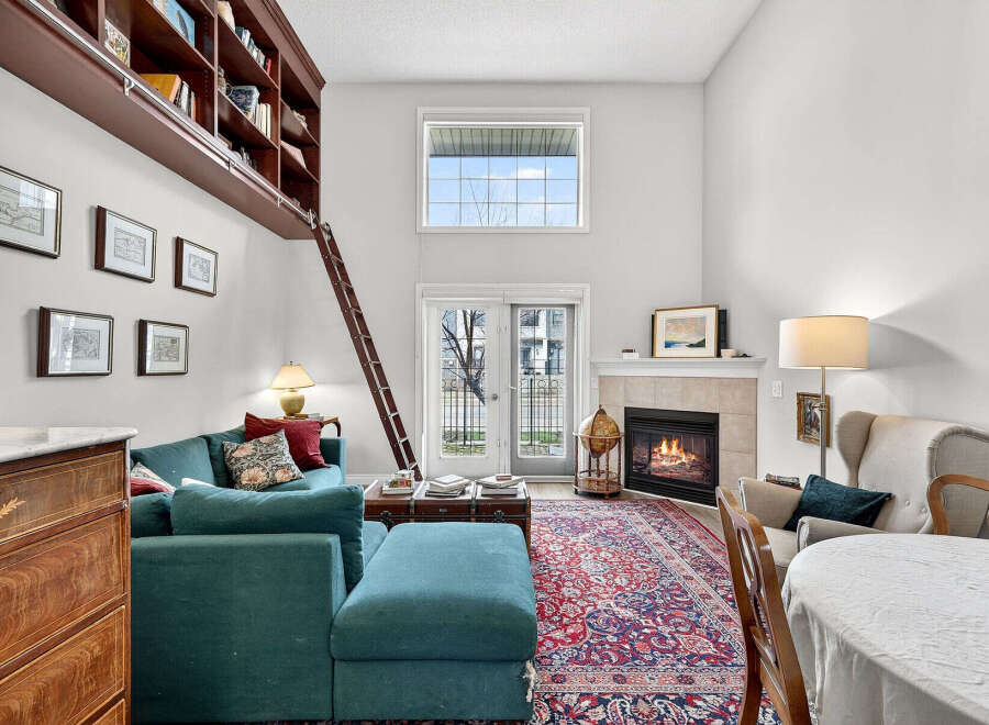 Step into luxury with this stunning property featuring a cozy fireplace, perfect for those chilly evenings.