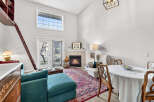 This stunning property boasts a cozy living room with a fireplace, perfect for relaxing evenings.