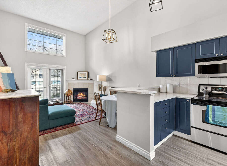 Discover the charm of this stunning property! Featuring a cozy living space with a fireplace, perfect for relaxing evenings.