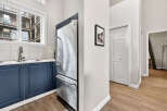 Discover this stunning property featuring a modern kitchen with stainless steel appliances and sleek cabinetry.
