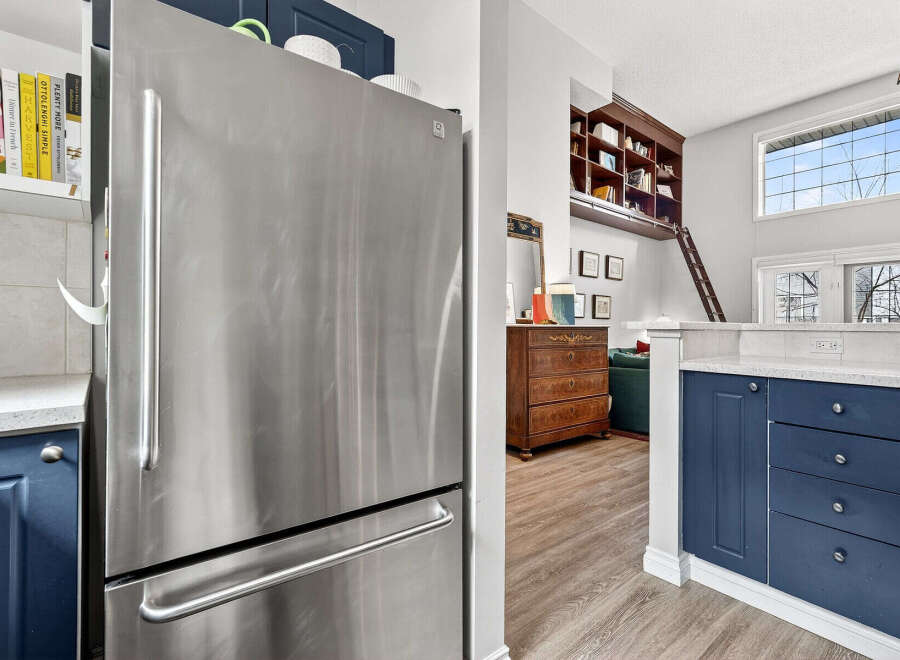 This stunning property boasts a modern kitchen with stainless steel appliances and ample storage.