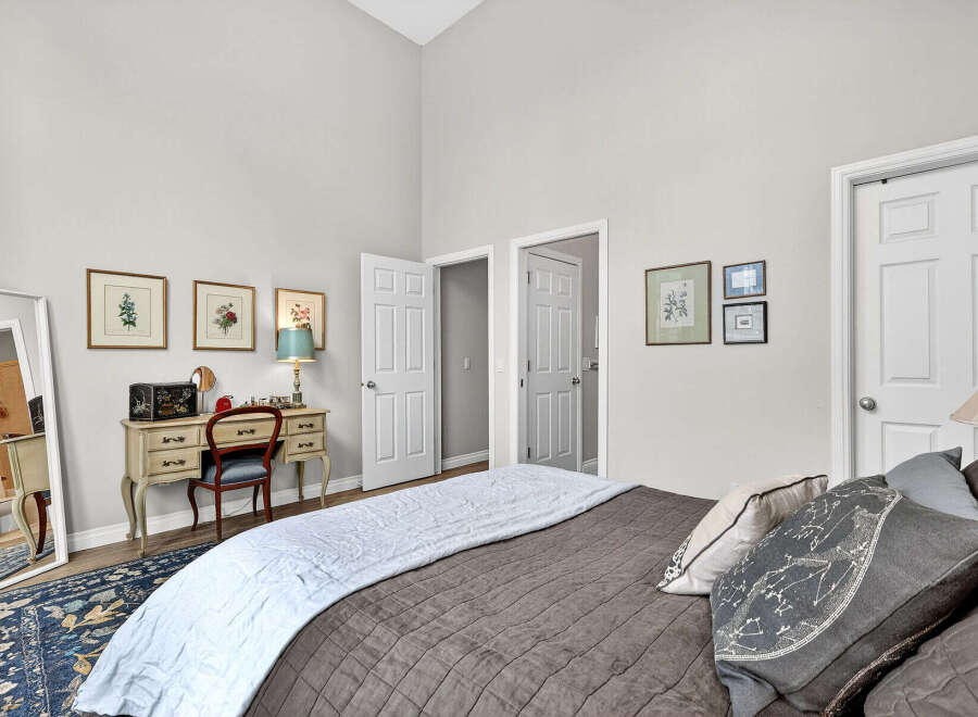This charming bedroom offers a serene retreat with its elegant design and inviting ambiance.