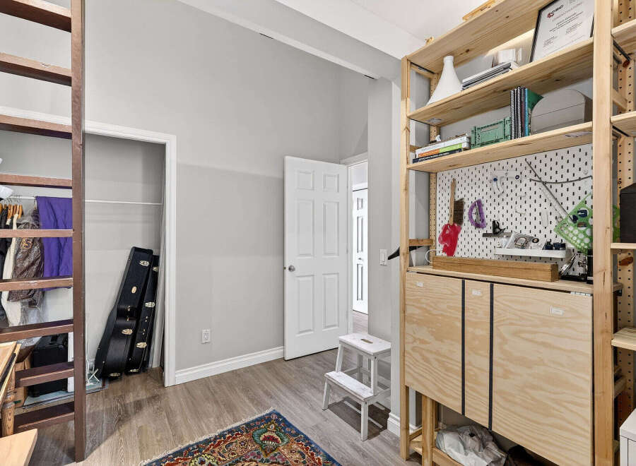 Discover the charm of this well-organized space, perfect for creative pursuits or storage.