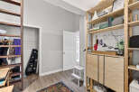 Discover the charm of this well-organized space, perfect for creative pursuits or storage.