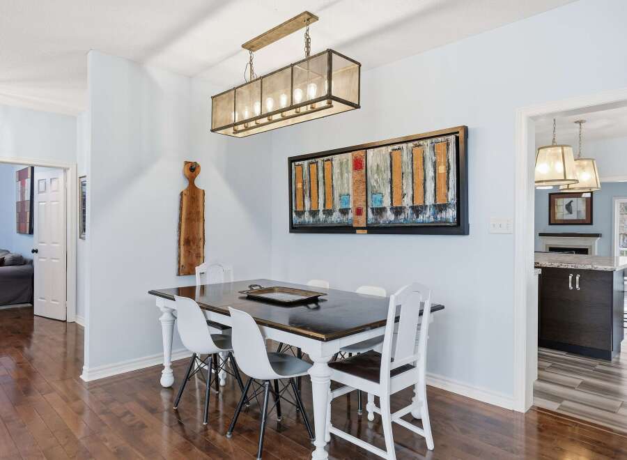 Step into this inviting dining area, perfect for hosting gatherings or enjoying intimate meals.