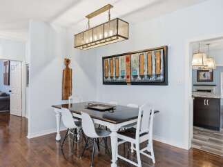 Step into this inviting dining area, perfect for hosting gatherings or enjoying intimate meals.