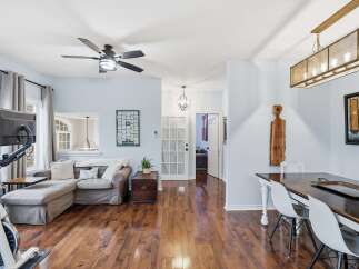 Step into this inviting living space, featuring a modern design and ample natural light.
