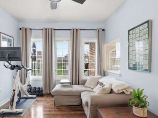 This stunning property boasts a bright and airy living space, perfect for both relaxation and fitness.