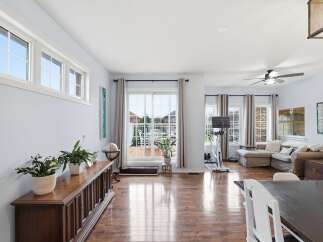 Step into this inviting living space, featuring a seamless blend of comfort and style.