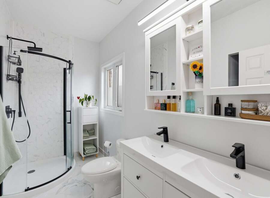 Step into a modern oasis with this stunning bathroom.