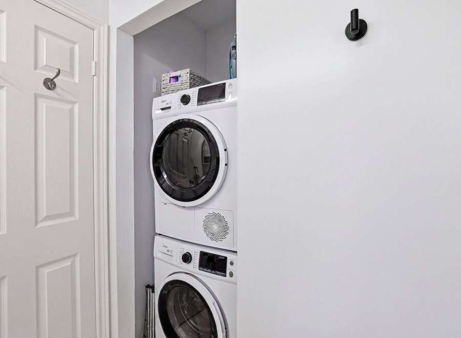 Discover the convenience of in-unit laundry with this stunning property! This home features a modern stacked washer and dryer, making laundry day a breeze.