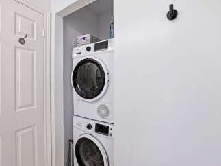 Discover the convenience of in-unit laundry with this stunning property! This home features a modern stacked washer and dryer, making laundry day a breeze.