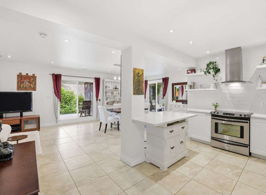 This stunning property boasts a bright and airy open-concept design, perfect for modern living.