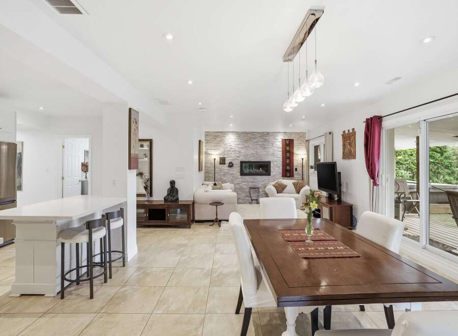 Step into luxury with this stunning property, showcasing an open-concept living space perfect for entertaining.