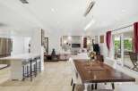 Step into luxury with this stunning property, showcasing an open-concept living space perfect for entertaining.