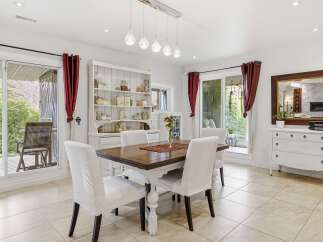 Step into this elegant dining room, perfect for hosting gatherings.