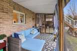 Enjoy the tranquility of this inviting outdoor space, perfect for relaxation and entertaining.