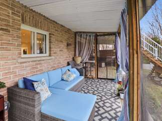Enjoy the tranquility of this inviting outdoor space, perfect for relaxation and entertaining.