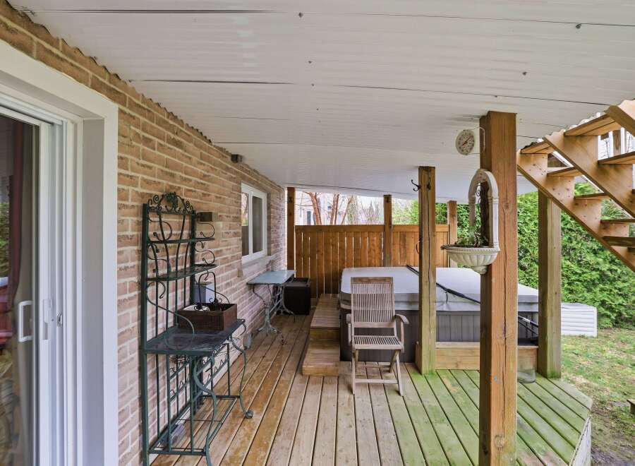 Enjoy outdoor living at its finest with this charming property featuring a covered deck.