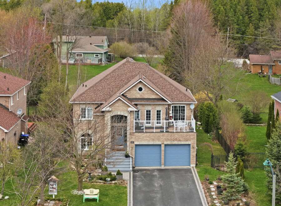 This stunning property boasts a beautiful brick exterior and a charming curb appeal.